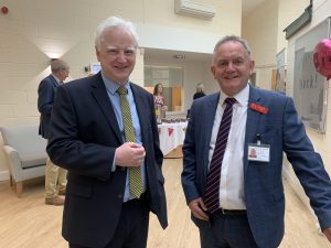 L–R: Katharine House Hospice CEO, Dr Richard Soulsby, and Trustee, Mike Smith, pictured smiling at the opening of the Therapy & Wellbeing Centre at Katharine House Hospice.