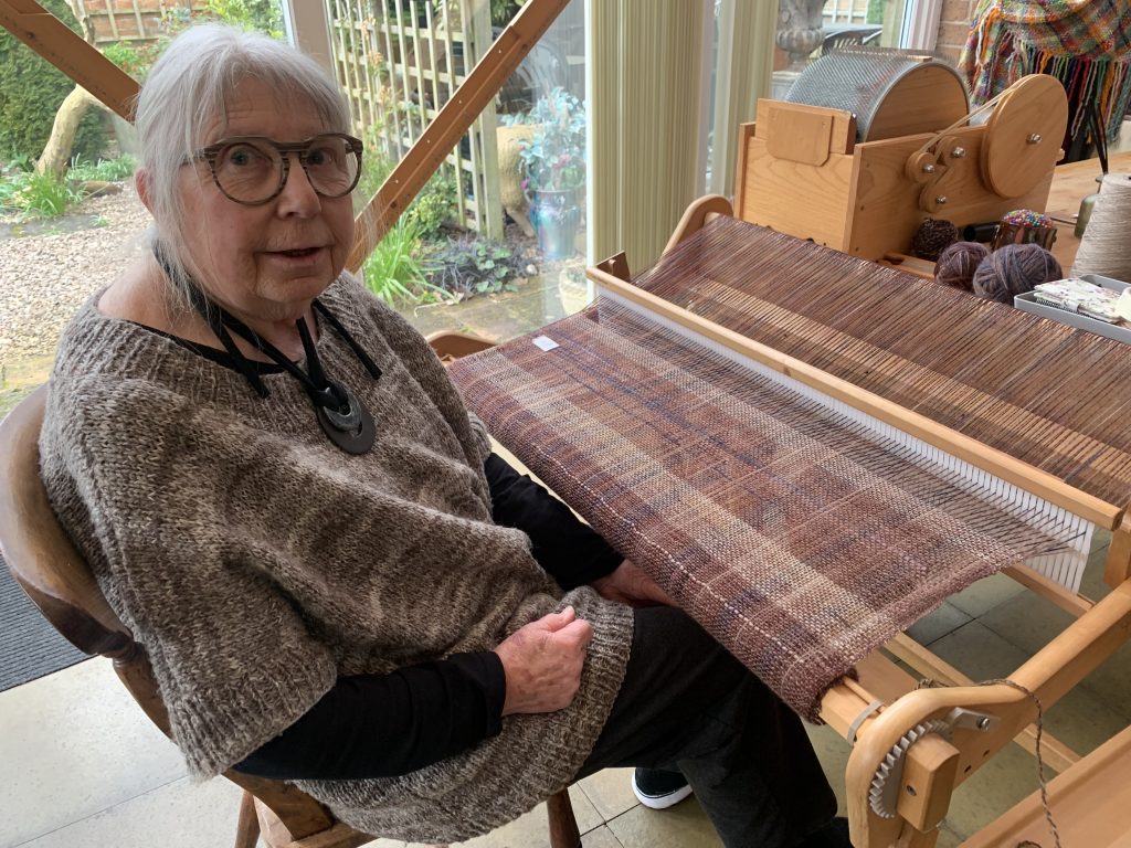 Chris with her loom.